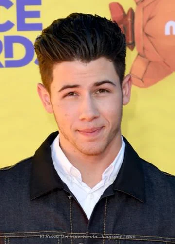 NickJonas-OrangeCarpet-KCAUS2015.png