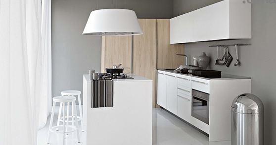 Smaller-White-Kitchen-with-Light-Wood-Elements