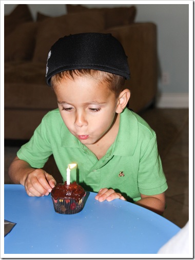 nate blowing out candle (1 of 1)