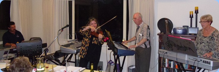 Peter Littlejohn (left) joining in the fun with Marian Burns, Peter Brophy and Jan Johnston (right) jamming