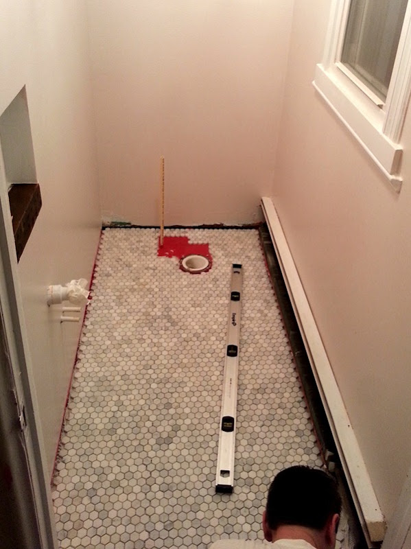 Marble tile floor in powder room