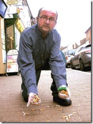 Paul Bartlett picks up cigarette butts in Stony Stratford     