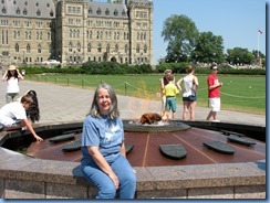 6088 Ottawa - Karen in front of the Centennial Flame  at Parliament Buildings - Centre Block