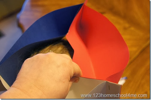 fit to child's head and staple the top together fit to child's head and staple the top together