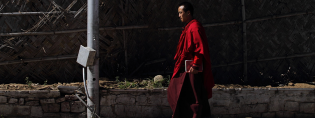 Bhutanese Monk walks the streets of Thimphu