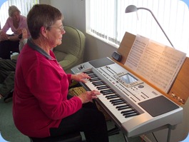 Our gracious host, Pam Rea playing her Korg Pa80