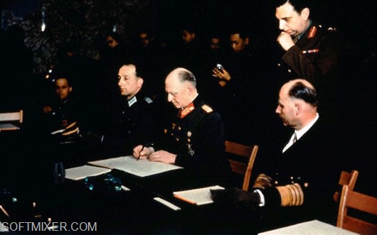 07 May 1945, Reims, Germany --- This photograph relates to the German surrender signing.  Col. General Gustav Jodl signs for Germany at Reims.  General Admiral Hans G. Von Friedeburg of the German delegation is also shown. --- Image by © Bettmann/CORBIS