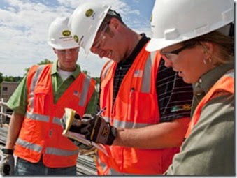 PCL employees on a jobsite in PPE (Personal Protective Equipment).