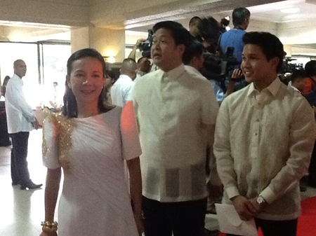 Grace Poe with husband and son