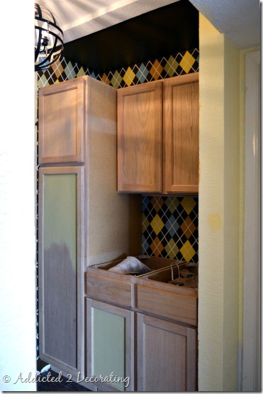 utility closet with cabinets 1