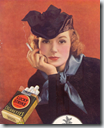 Una mujer fumando, símbolo absurdo de la liberación femenina., producto de la propaganda manipuladora. Una mujer fumando, símbolo absurdo de la liberación femenina., producto de la propaganda manipuladora.