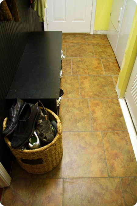 laundry room with peel and stick tile