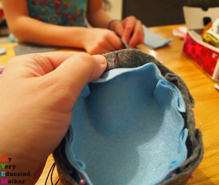 Sewing together origami inspired felt bowl