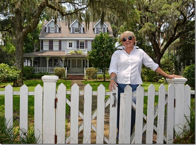 Interior designer/preservationist Jane Coslick stands in front of an Isle of Hope home on Bluff Drive that she renovated in the early 1980's. (John Carrington/Savannah Morning News)