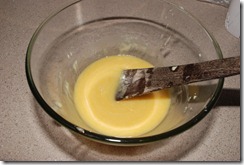Melted white chocolate added to the beaten mixture