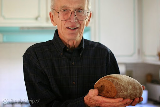George Holding Rye Bread