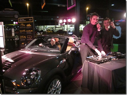Paul Legerton, Blue Bell MINI Manager (left), takes to the decks with Chris Booth, to welcome the new MINI Roadster to the dealership