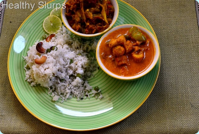Platter of Peas Pulao, Baby Corn and Capsicum Curry, and Baingan Bharta