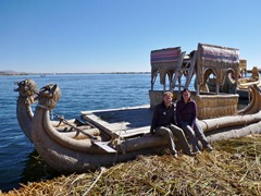 Posing with a reed boat on Lake Titicaca.