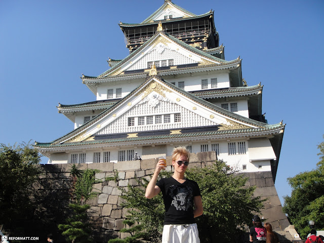 drinking Austrian beer in front of Osaka Castle in Osaka, Japan 