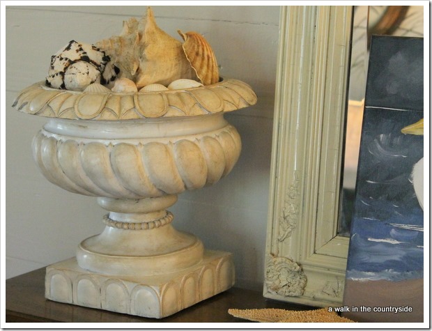 seashells in urn for coastal touch