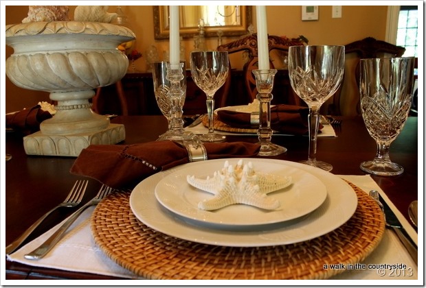 elegant table with brown, white & seashells