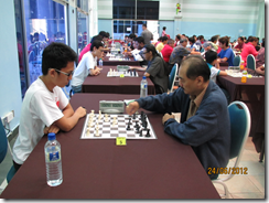 Syakir Syazmeer Azhar vs John Law, board 5, round 5.