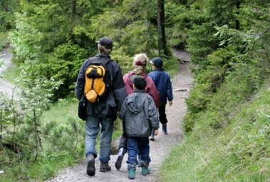 family-walking-in-woods