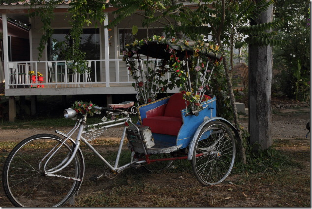 A Flowery Cycle Rickshaw at Ban Pai Riverside Hotel Property