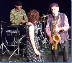 Jim Langabeer on Sax 'flirting' with Maria O'Flaherty. Whilst drummer Jason Orme keeps the temp nice and tight.
