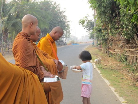 Giving alms for monk