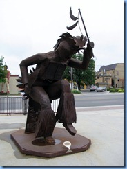 2621 Minnesota Bemidji - Niiemii (meaning He dances) pow wow dancer metal sculpture in park near Paul Bunyan statue