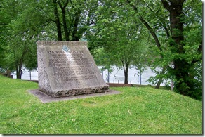 Daniel Boone stone monument, Kanawha River in background.