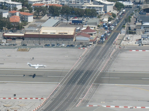 Gibraltar World s Only Airport Runway Intersecting a Road