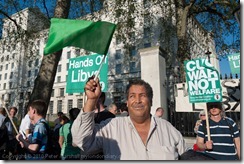Gaddafi supporter at stop the war demonstration