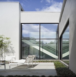 Casa Jigsaw / David Jameson Arquitecto fachada-moderna