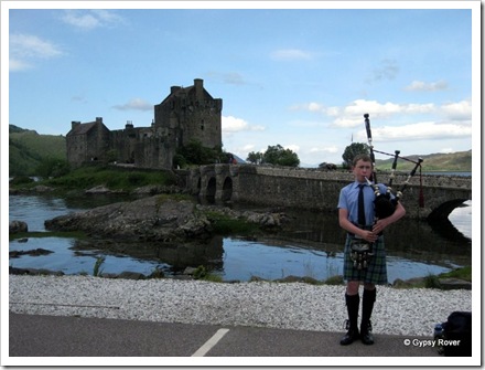Piper at Eilean Donan castle.