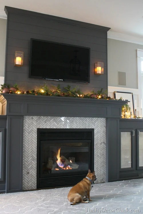 gray fireplace herringbone tile