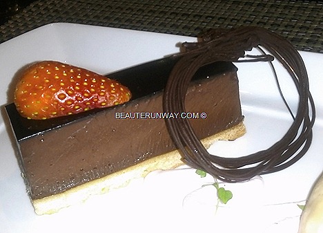 The Halia dessert Star anise chocolate bar served with salty caramel ice cream and strawberry meringue