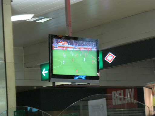 Watching the game at the station