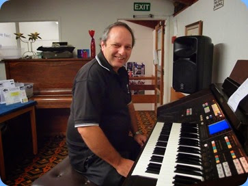 Doug Farr setting-up the Technics GA3 organ. Photo courtesy of Dennis Lyons
