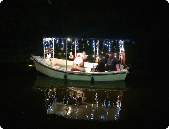 Father Christmas arrives via the Audlem Lass water  taxi