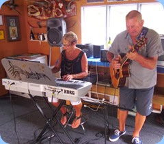 Our gracious and talented hosts, Jan and Kevin Johnston, giving one of their several mini concerts during the day and evening.