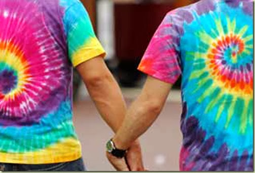 Gay couple in tie-dyed shirts at AIDS walk