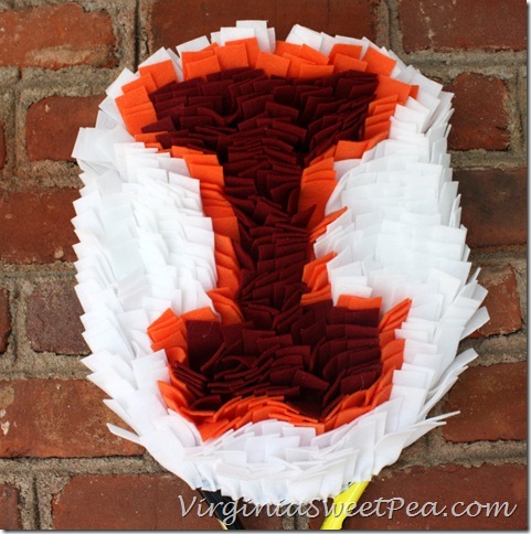 Iowa State Tennis Racket Wreath - Use an old or broken tennis racket to make a school pride wreath that can hang on a wall or door.