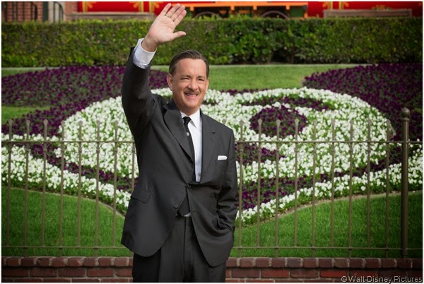 Walt Disney (Tom Hanks) at the front gate of Disneyland.