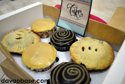 Six pastries in a box from UnmisCAKEable by Jaja: White Temptation, Dark Decadence, and Classic Apple Pie