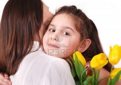 [13281846-little-daughter-hug-her-mom-with-bouquet-of-yellow-tulips%255B2%255D.jpg]