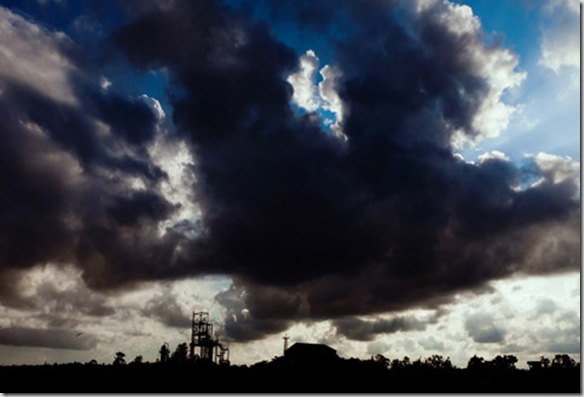 Clouds are rising over the former Union Carbide (now DOW Chemical) factory in Bhopal, Madhya Pradesh, India, site of the infamous 1984 gas disaster.