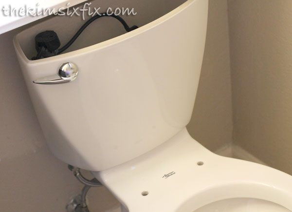 Installing toilet tank